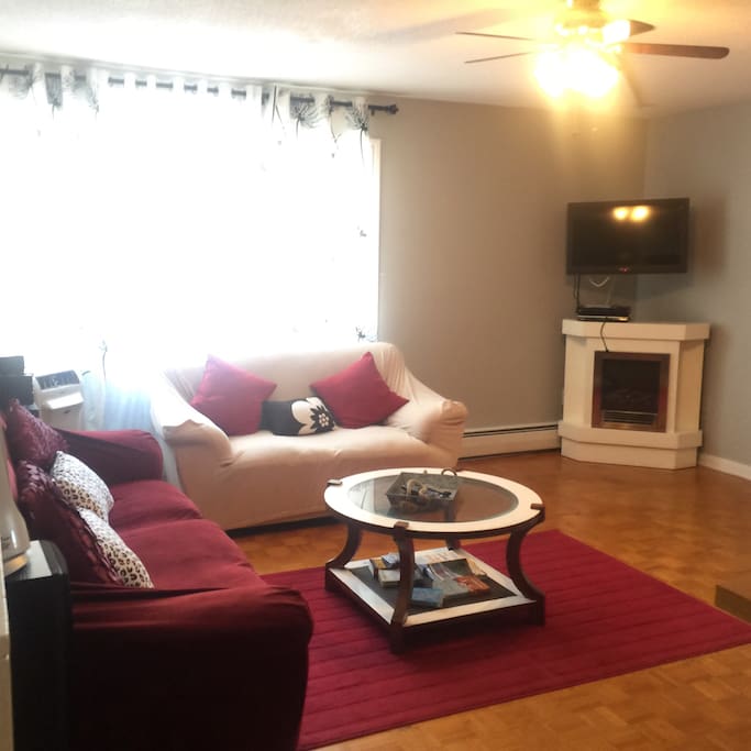 Living room with fireplace and plasma tv - free wireless and basic cable