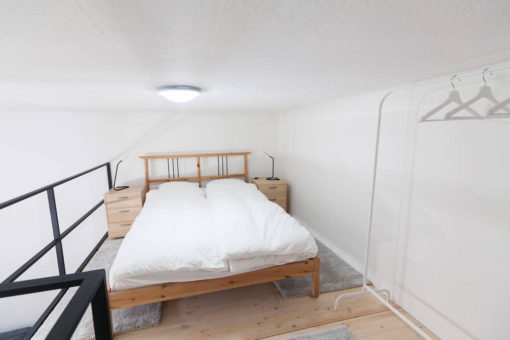 King sized bed on the mezzanine-level