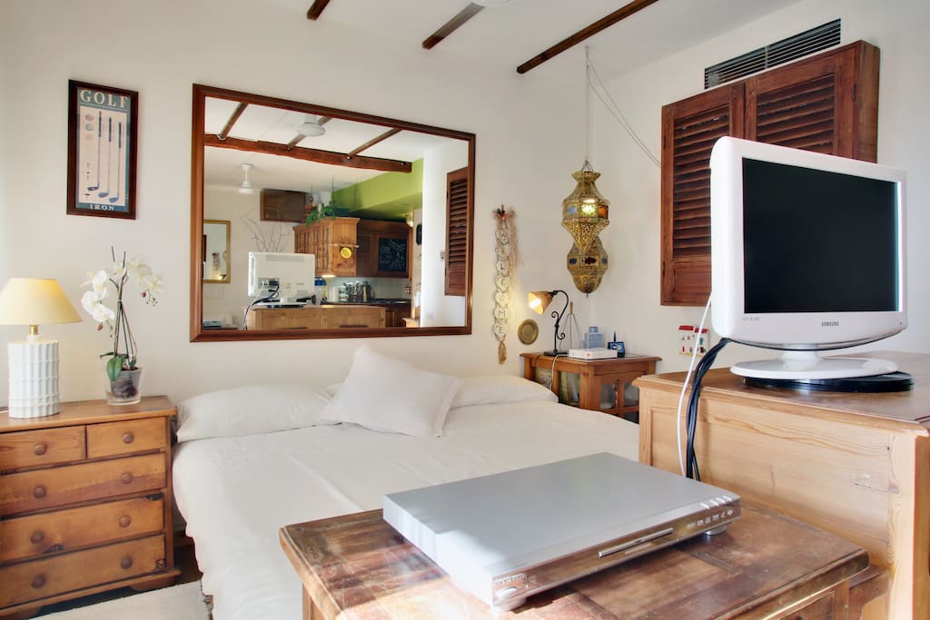 A comfortable double bed with television to watch