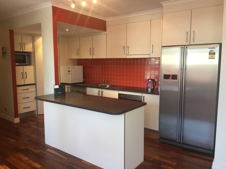 Kitchen with Large fridge freezer