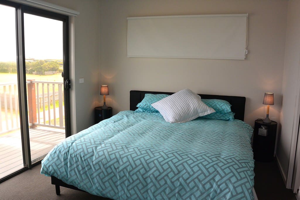 King size bed upstairs with en-suite