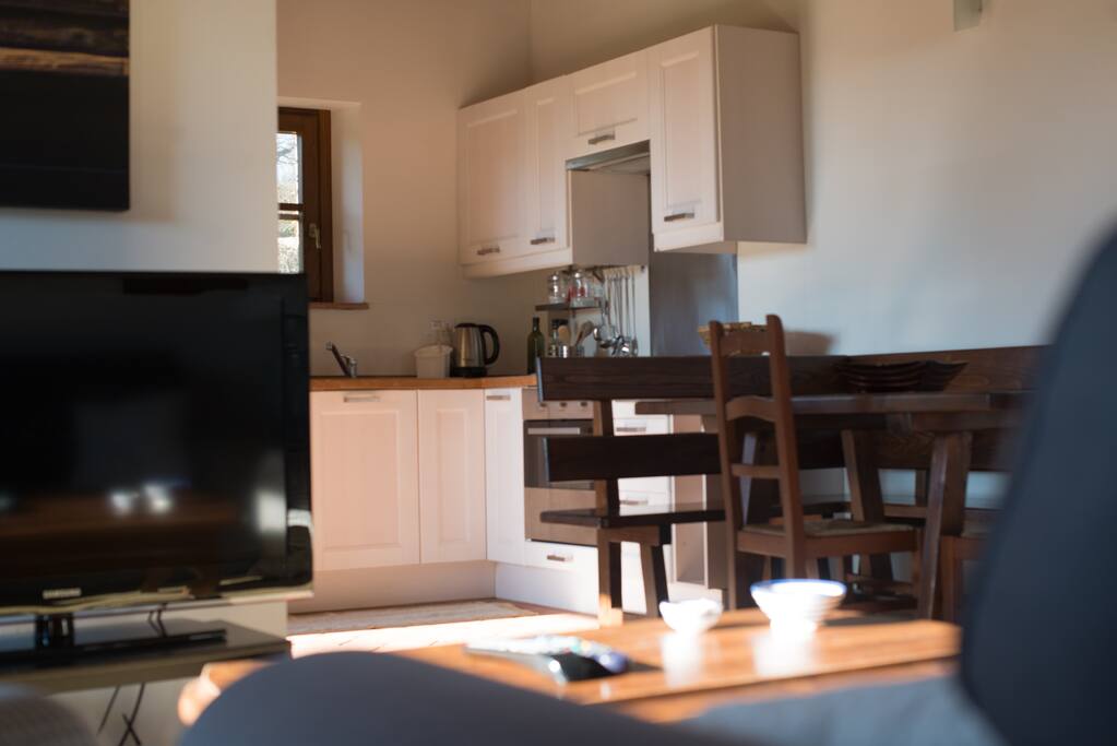 Comfortable open plan kitchen, living and dining space.
