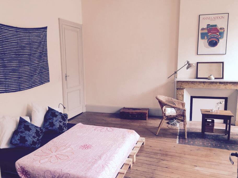 The bed is made of mattresses over pallets