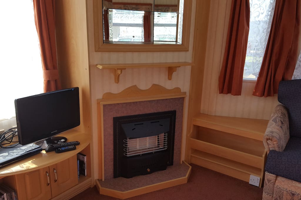 TV with DVD player, gas fire
