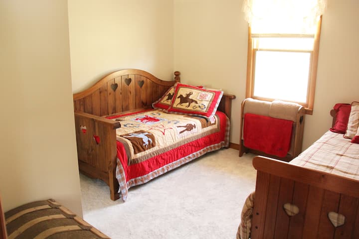 Bedroom with 2 twin beds and pull out trundle bed.  Sleeps 3.