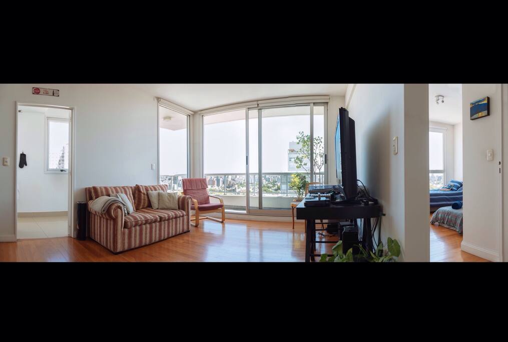 The living room looking towards the balcony and its amazing view
