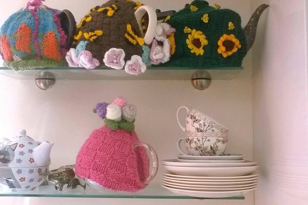 Some of my teapots. I like to bake cakes and make afternoon tea.