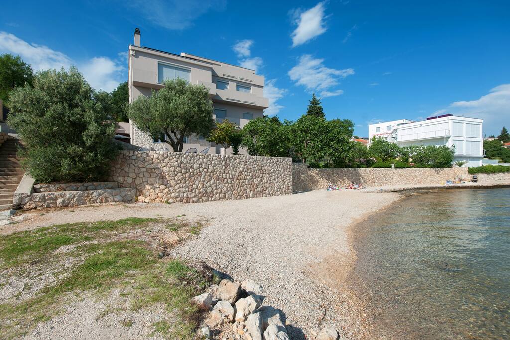 Beach in front of the house.