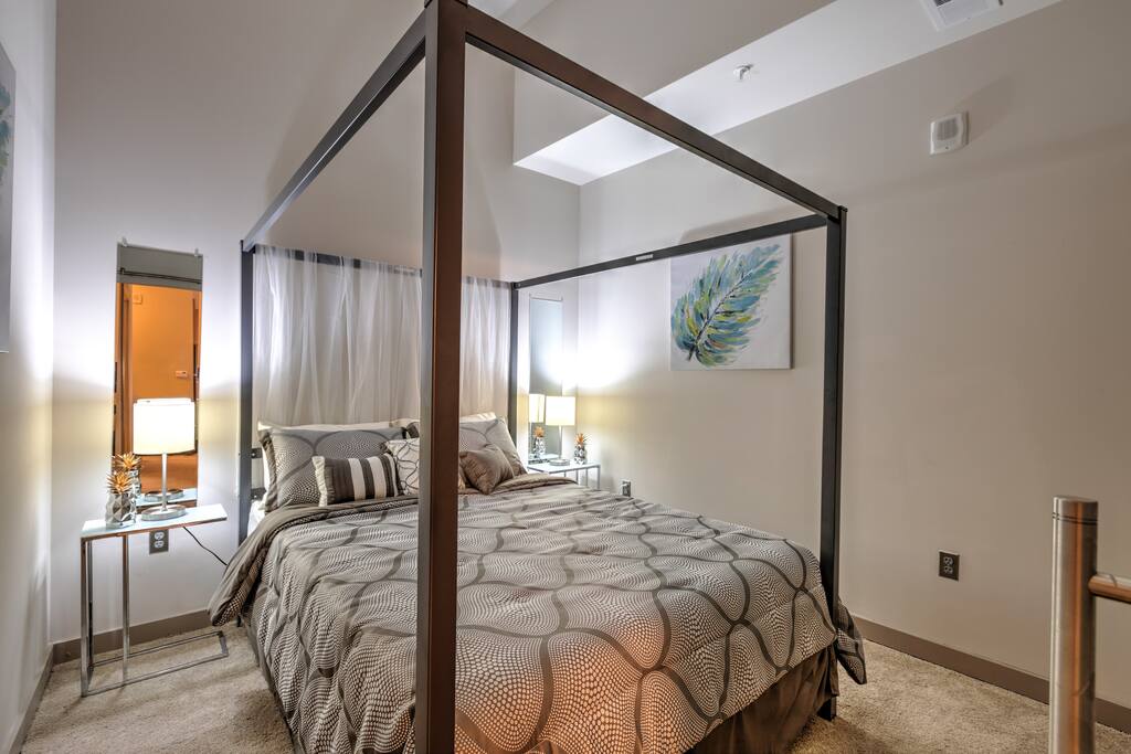 Bedroom retreat with queen memory foam bed + USB ports on night table