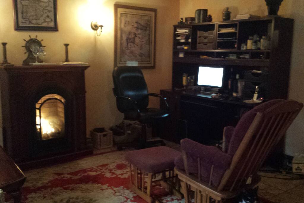 Your office has a gas fireplace to warm you, an executive style desk with printer for your computer, and large sliding glass doors with a view to the patio. Perfect for a winter's work day.