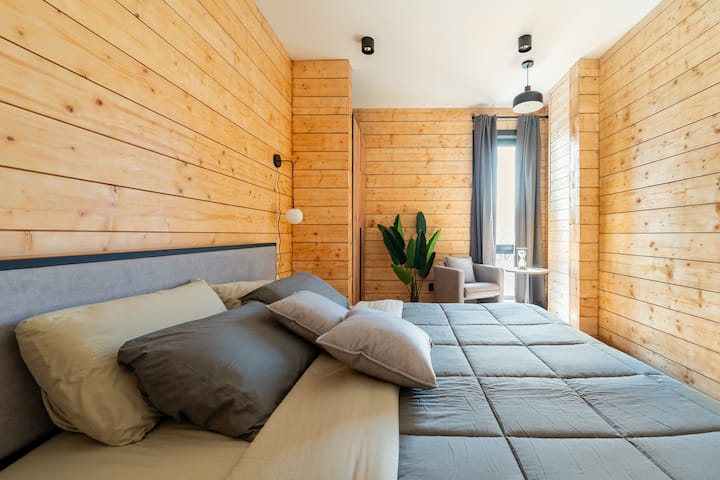 Soothing Sanctuary: Wake up refreshed in this tranquil master bedroom, where luxury meets the comfort of home, perfect for a restorative escape.