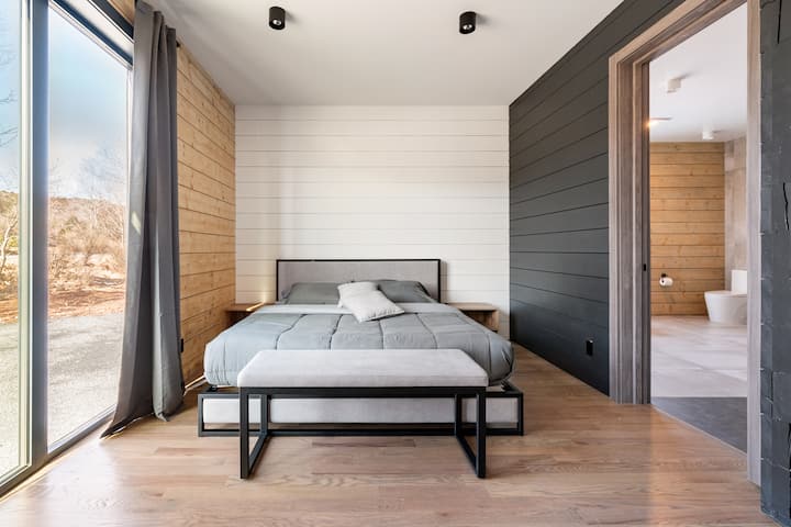 Cozy Quarters: Twin bunk beds make this room an inviting space for younger guests or singles, crafted for comfort and camaraderie.