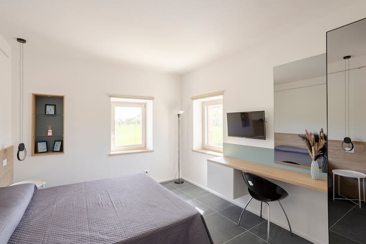 غرفة نوم 2 بسرير مزدوج أو أسرّة مفردة عند الطلب إذا لزم الأمر مع تلفزيون ذكي 32 بوصة 