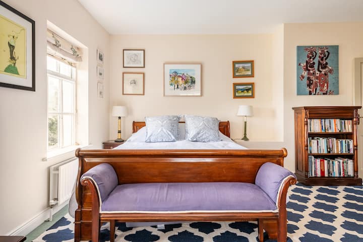 Bedroom with a super kingsize bed and en suite bathroom