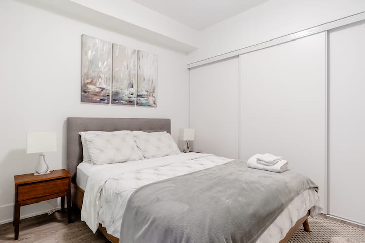 Bedroom with queen size bed and fresh linens provided