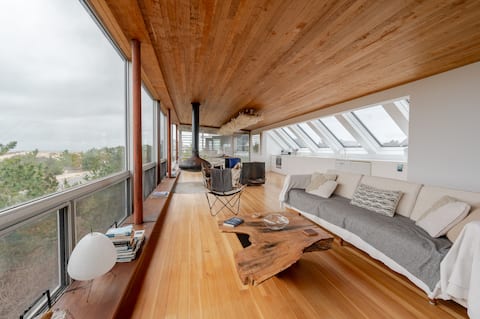 Modern Architectural Gem with Panoramic Coastline Views