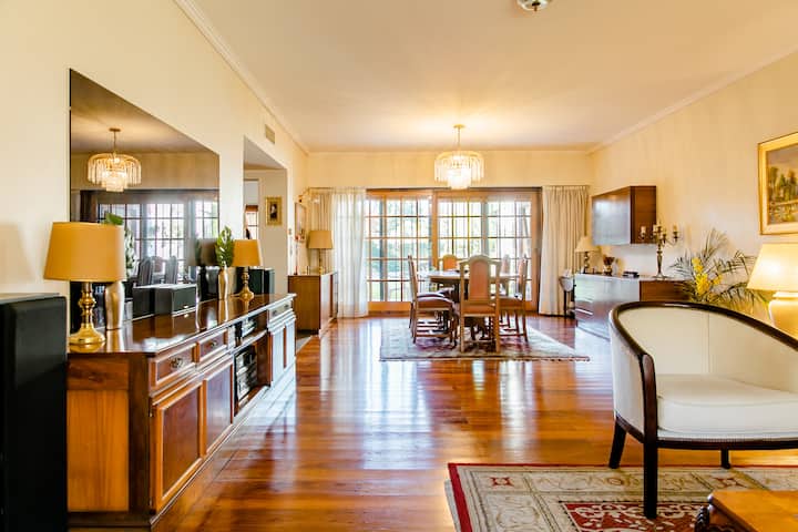 Quarto em suíte em casa em Martínez