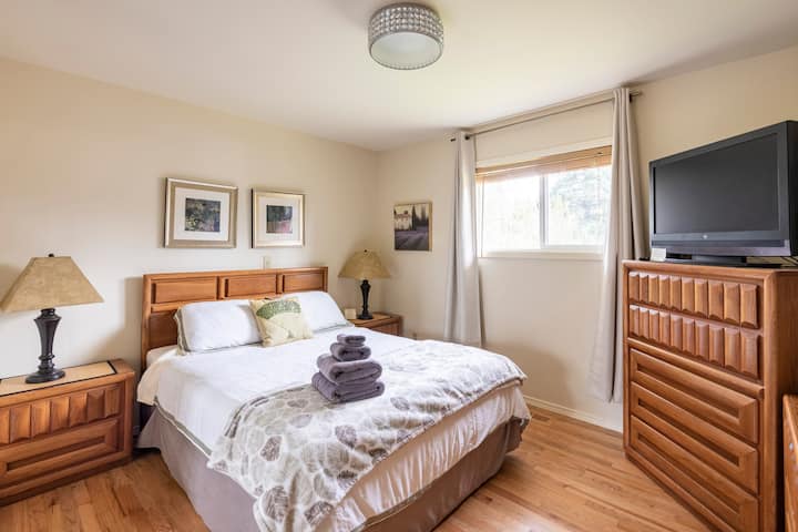 Bedroom 2 with bamboo bedding and Roku TV
