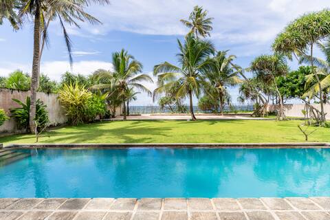 Green Parrot Beachfront Villa with Private Pool
