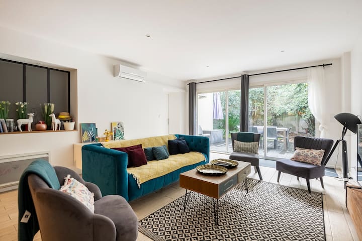 Magnifique rez-de-jardin contemporain