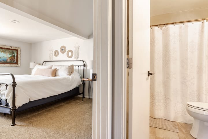 Upstairs bedroom with adjacent bath (shared with loft)