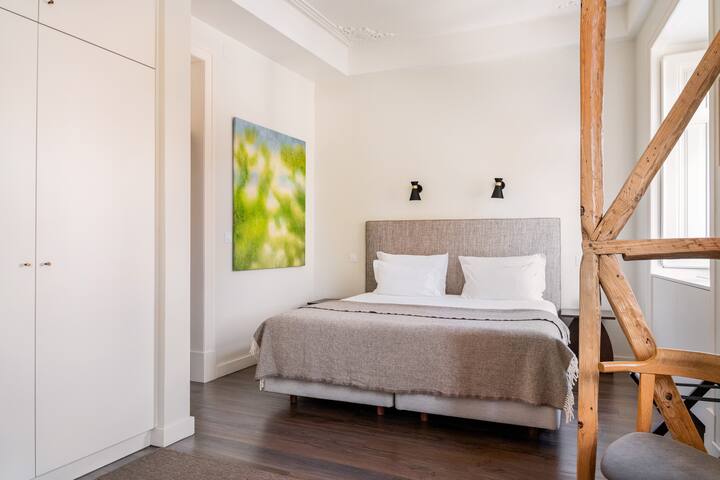 Marble, Molding, and Timber Frames at a Stylish City Retreat gallery image 5