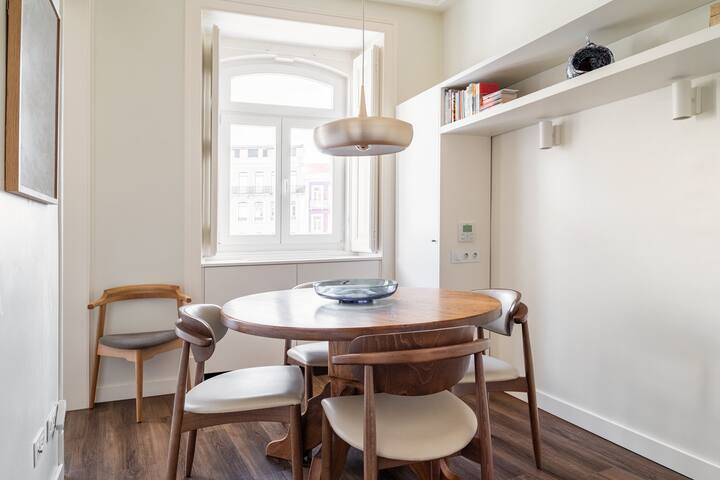 Marble, Molding, and Timber Frames at a Stylish City Retreat