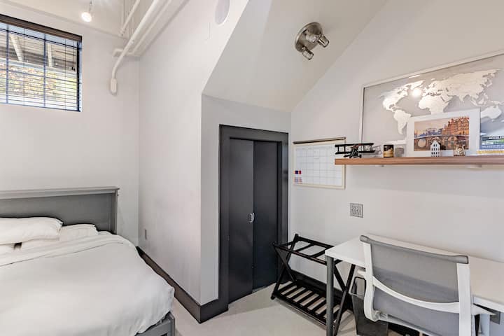 The third bedroom features a Queen memory foam matrress and a Herman Miller OE1 desk and Setu Chair