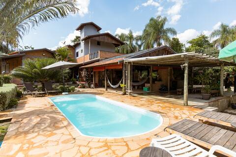 Swimming pool, outdoor fireplace and beach tennis