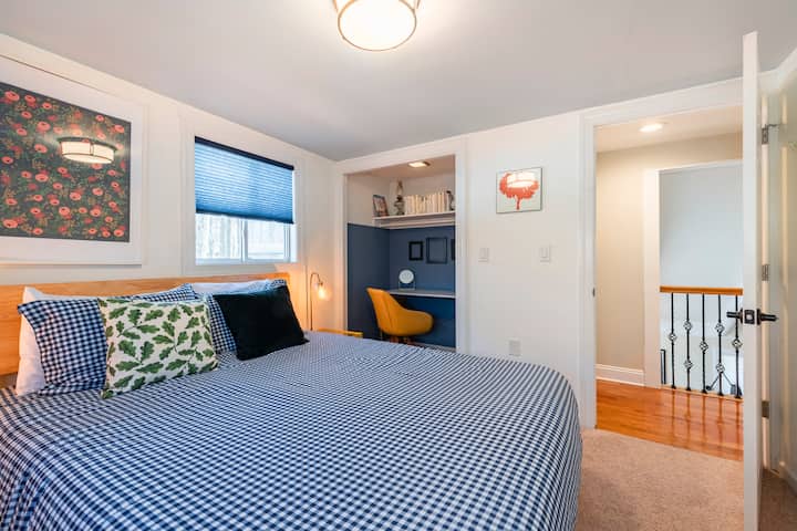 Upstairs Queen Bedroom - with office space. 

Each bedroom features a Tulo mattress with zippered mattress protectors, zippered pillowcase protectors, a sound machine, dimmable lamps, room darkening shades, and HVAC with remote for heat/cool control.