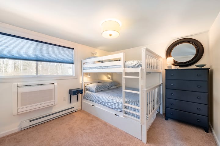 Upstairs bunk room: full bed over full bed with twin trundle

Each bedroom features Tulo mattress with zippered protector, zippered pillowcase protectors, sound machine, dimmable lamps, room darkening shades, HVAC with remote for heat/cool control