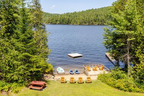Private Sandy Beach with 125 feet of lake frontage