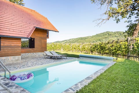 House in a green oasis with a heated pool