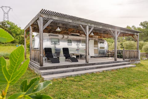 The charm of the airstream among the olive trees