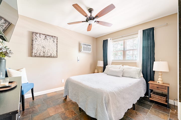 Tranquil bedroom with soft linens and a calming atmosphere for restful nights.