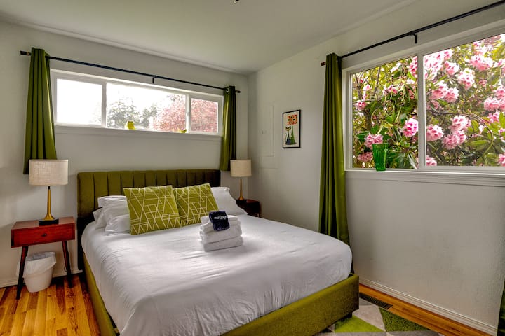 The Olive Green Room harkens back to the Mid-Century. The lamps by all of the beds look retro but are actually USB chargers for all of your personal equipment. Just touch them anywhere and they light right up!