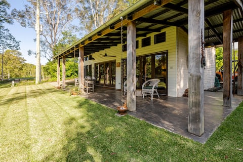 Popular Airbnb listing: Unique Bangalow Mudbrick Cottage on a lovely farm. in Bangalow