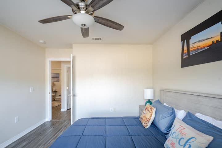 Relax in the bedroom featuring a luxurious king-size bed, nightstand, and dresser—everything you need for a restful night’s sleep!