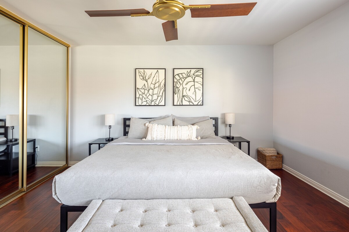 Comfortable, king sized bed and seating options while getting ready for the day.