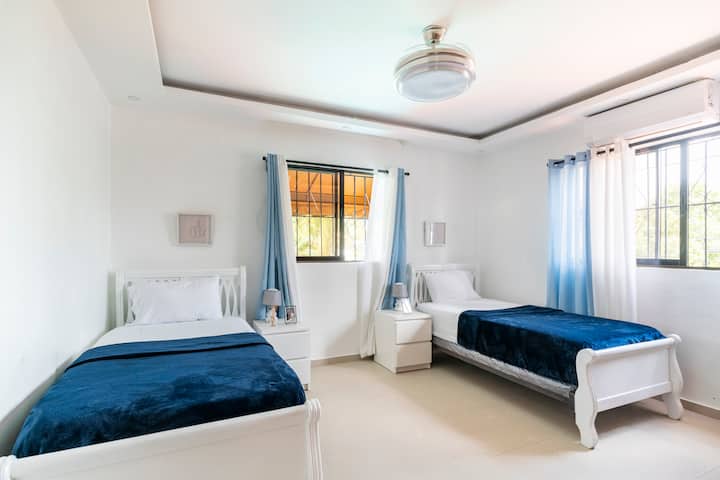 Bedroom upstairs with 2 twin beds.