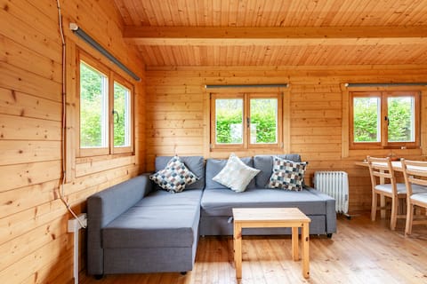 Log cabin on organic farm