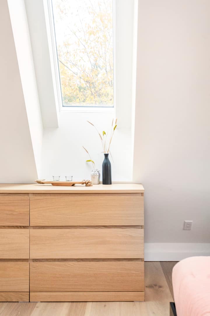 Dresser and skylight up in the loft