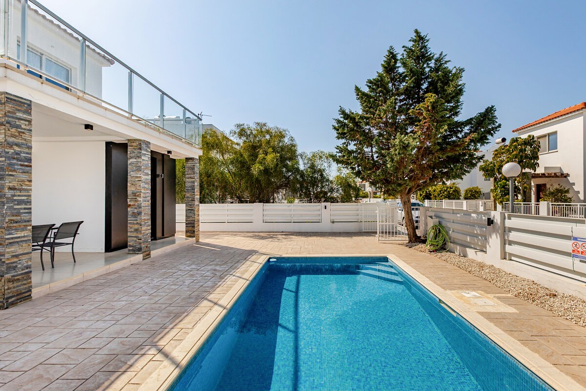 Beach house exterior at sunset