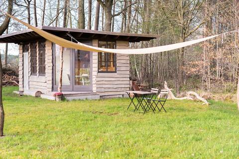 Private accommodation in the woods near horses.