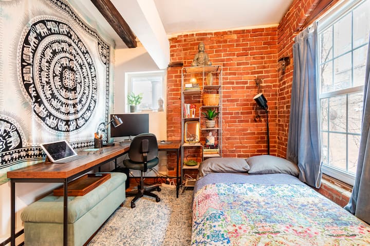 Plaza de oficina exclusiva con sofá cama.