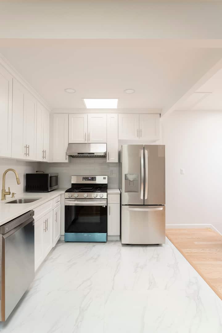 Full kitchen with oven, stove and dishwasher