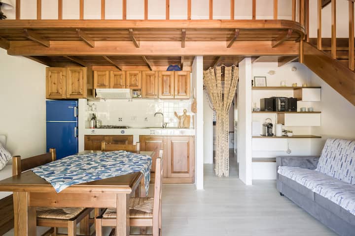 Sala de estar con cocina pequeña 1