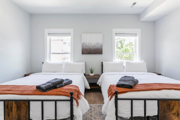 Bedroom 1: Two queen beds located on main floor