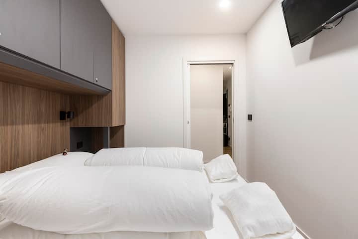 Cozy double bedroom with a double bed, memory foam mattress, and a bridge wardrobe with six drawers and ample space for clothes. Amazon Fire Stick, enter your Prime Video, Netflix, Disney+, Spotify account or install new apps!