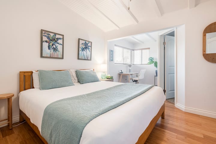 Bedroom 1: King bed, desk with charging station and connected bathroom 